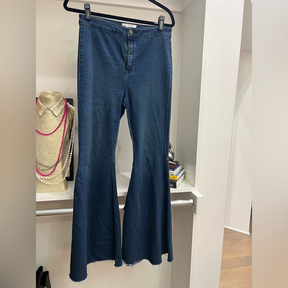 Free people float on flare jeans. Size 28. Wash: rich blue